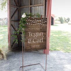 poster in white frame with floral decoration